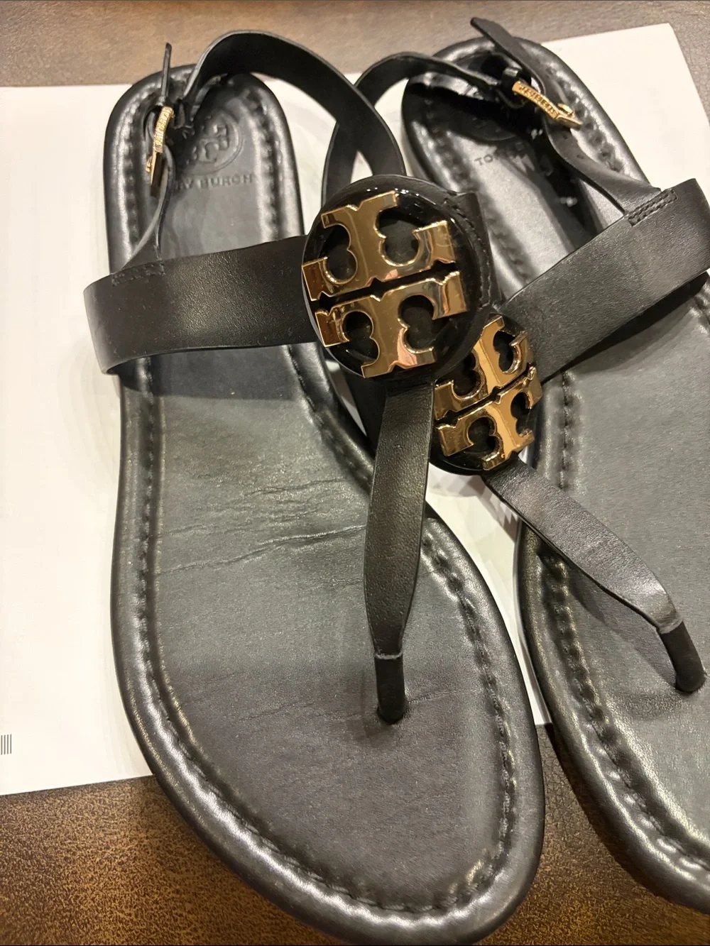 Tory Burch Black Leather Sandals with Gold Logo Medallions